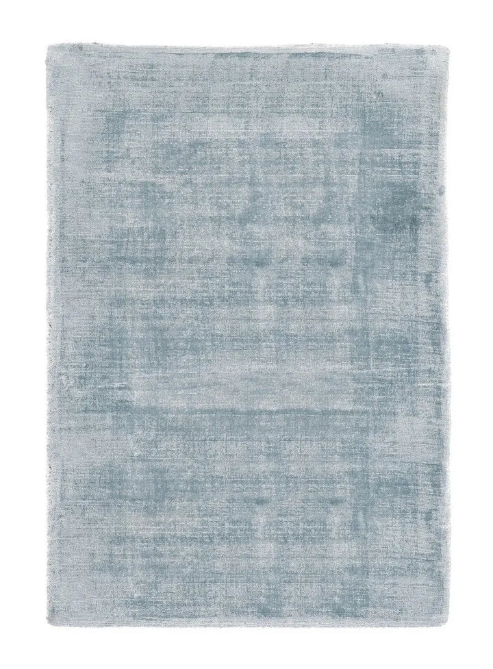 Tappeto Rashmi azzurro con finitura vellutata
