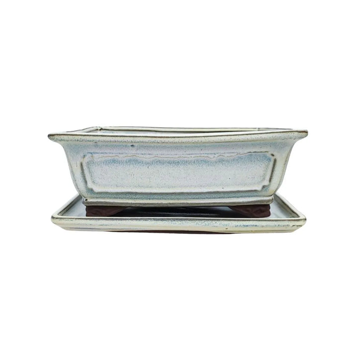 Vaso rettangolare per piante ornamentali in ceramica crema con base rialzata e fori di drenaggio