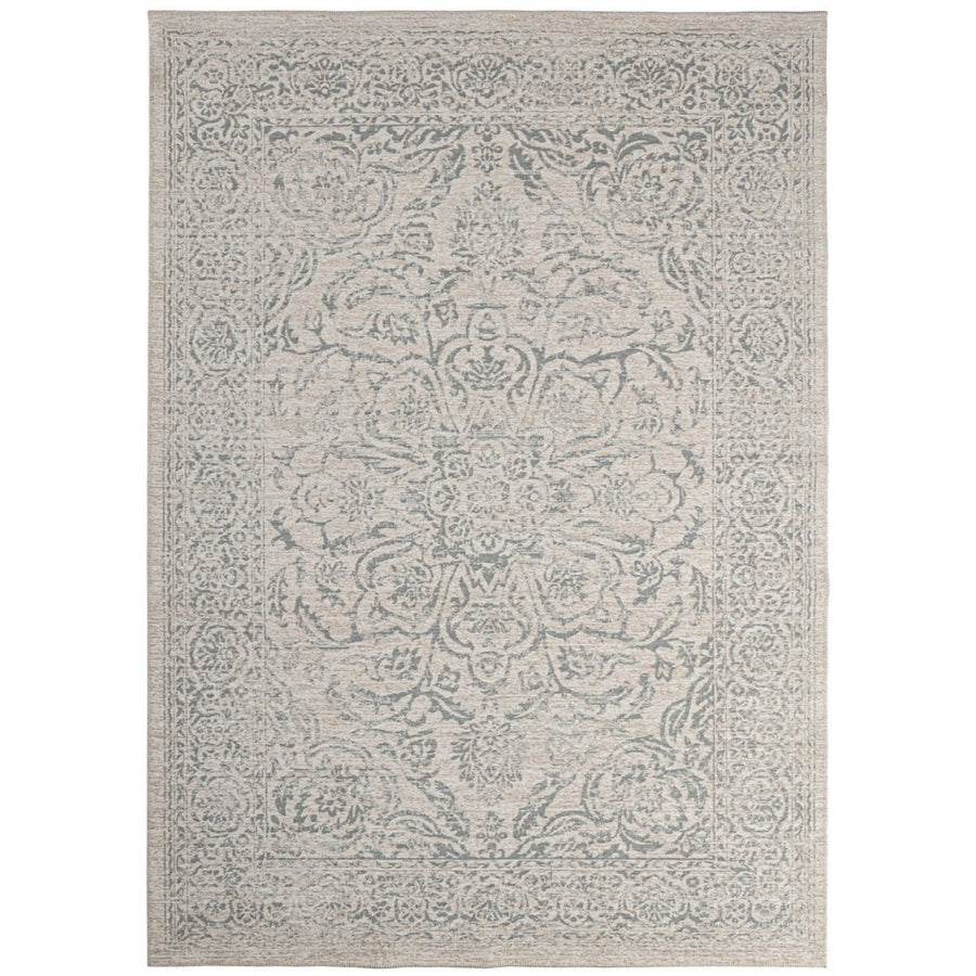 Tappeto stile orientale beige con dettagli floreali in rilievo, effetto vintage e finitura elegante.